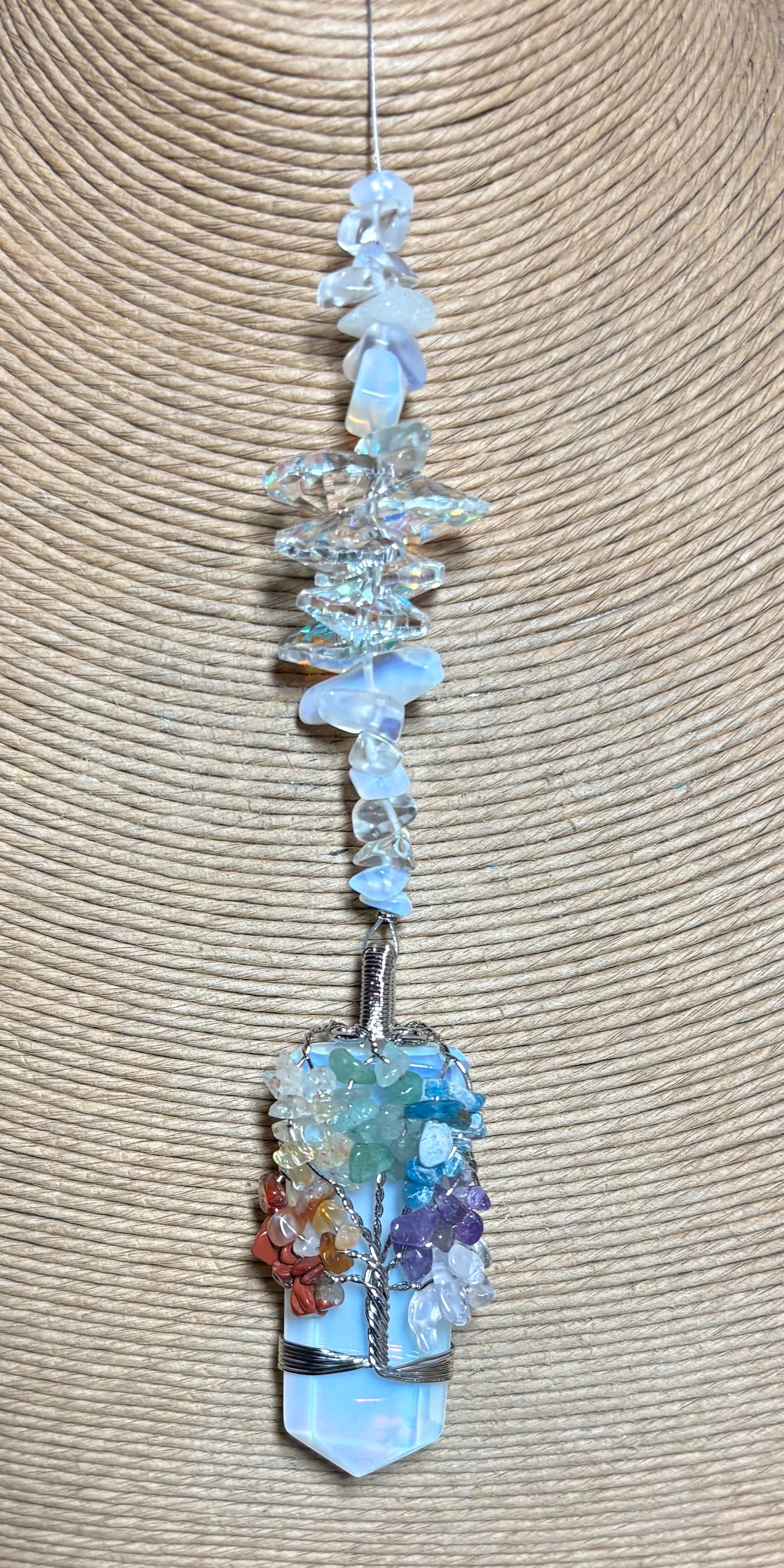 Large Terminated Point Crystal Wrapped with Tree of Life